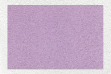 Texture craft light lilac paper background with white border, macro. Structure vintage kraft purple cardboard