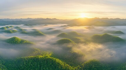 A scenic mountain landscape covered in morning fog and sunlight