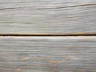 Close-up image of a weathered grey wooden texture.