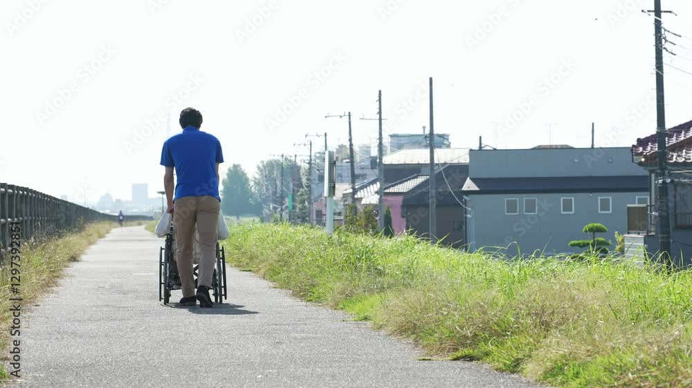 Aufkleber シニア、男性、介護福祉士、介護、車椅子、散歩、介護士、ヘルパー、後ろ姿、外出、屋外、歩道、サポート、デイサービス、高齢者、お年寄り、老人ホーム、施設、デイケア、レク、住宅街、公園、道、自然、青空、コピースペース、背中、福祉、ウェルネス、障害、障がい者、ボランティア、日本人、サービス、支援、フレイル、サルコペニア、哀愁、高齢化社会、老後、終活、ホームヘルパー、風景、広角、看護、見守り、遠近感、ライフ