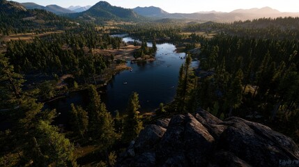 Serene landscape view from a rocky overlook showcasing a tranquil river surrounded by lush forests