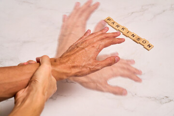 Senior man suffering from Parkinson syndrome