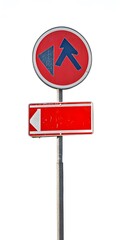 A road traffic sign indicates direction with two visible signs