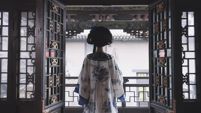Girl in Jin Merchant's Costume explores Pingyao Ancient City with grace and elegance