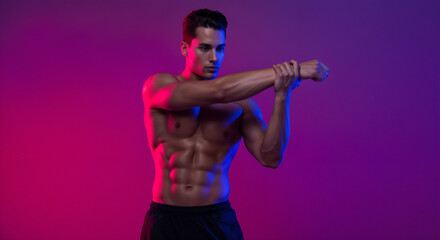 Muscular man warming up by stretching his arms, posed in a colored studio setting with a vibrant pink background. Highlighting fitness dedication, athletic lifestyle, and health commitment