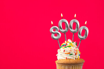 Number of followers or likes - Candle number 8000.