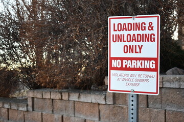 Loading and unloading only. No parking sign.