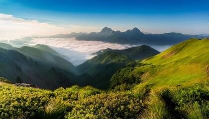 Fog and ocean of clouds in the mountain valley; highlands and low lying clouds in the mountainous valley with blue skies; beautiful landscapes; dramatic scenery