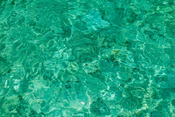 Sea water background in shallow waters