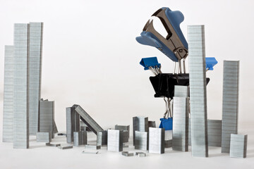 Conceptual monster done from paperclips and staples, staple city, with staple remover ogre monster,...