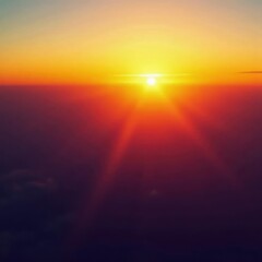 Sunrise bursts through clouds; fiery spectacle seen from aircraft , aerial, illumination