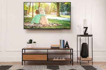 Movie playing on TV set in room