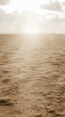 Obraz premium Serene Seascape at Sunset: Golden Hour Beach Scene