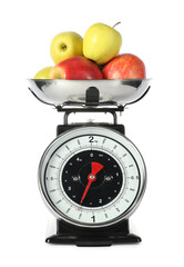Retro mechanical kitchen scale with apples isolated on white