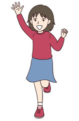 片手を上げて笑う元気な女の子