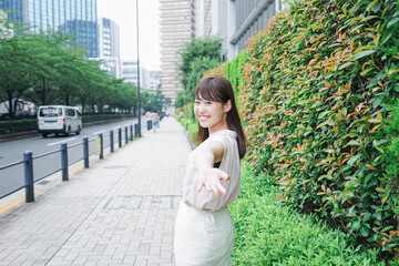Young woman walking on street