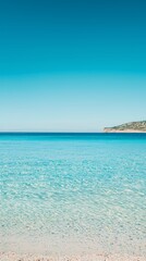Serene Turquoise Ocean and Clear Blue Sky Beach Landscape