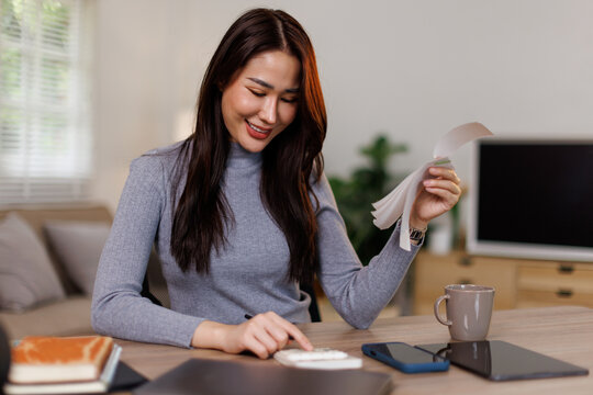 Tax deduction planning concept. Business asian woman calculating business balance prepare tax reduction.

