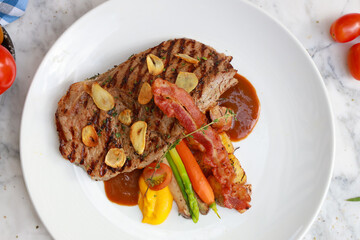 Culinary delight grilled steak with vegetables in an elegant setting