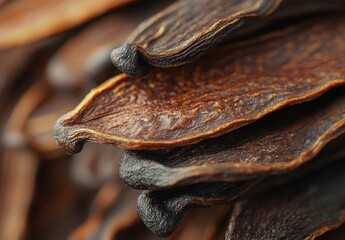 Close-up View of Natural Dried Spice Pods with Rich Texture and Deep Brown Color in Organic Arrangement for Culinary and Decorative Uses