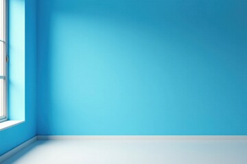 Empty room with a bright blue wall and a window, ready for design and decoration.  A minimalist interior scene showcasing a blank space for creative expression and potential home improvements.