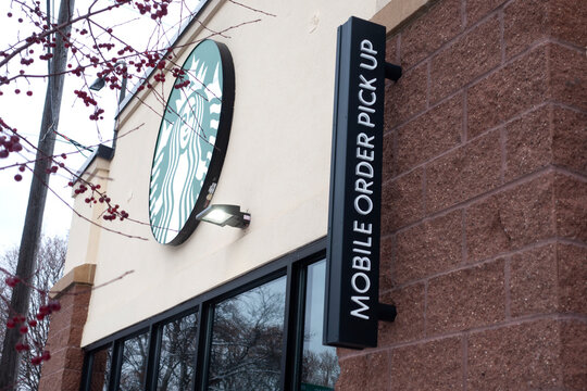 The popular Starbucks coffee shop with drive thru mobile pick up window for cell phone orders.St Paul Minnesota MN USA