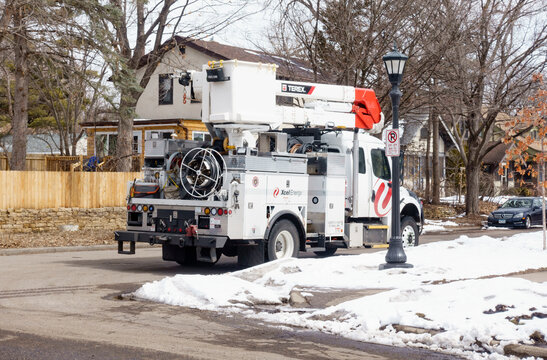 Xcel Energy Utility Company repair truck loaded with wire, tools and cherry picker on top, ready for any emergency. St Paul Minnesota MN USA