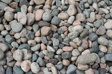 Smooth Multicolored Stones Forming a Textured Background of Natural Beauty