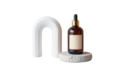 Amber Bottle with Label and Dropper on Concrete Stand next to a White Arch