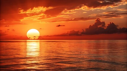 Fiery sunset over calm ocean waters.