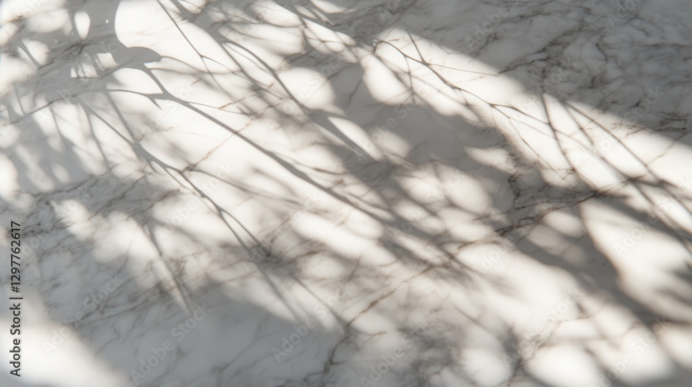 Poster marble tabletop with a soft matte finish, subtly illuminated, creating delicate abstract shadow effe