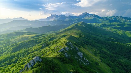 Aerial View of Rolling Hills and Majestic Mountains