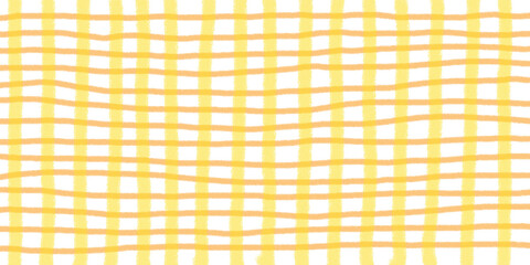 透け感がある手描きのラフな黄色とオレンジ色のチェック柄