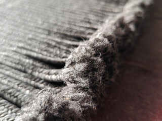 Detail of hand-woven natural fiber rug, rug concept