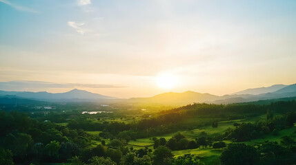 Fototapeta premium Golden Sunset Over Lush Green Valley And Rolling Hills With Dramatic Sky