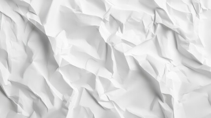 Fototapeta premium Creased white paper with folds and wrinkles as a textured background for posters.