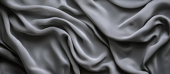 Obraz premium The artistry of fabric: voluminous gray folds.