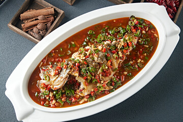Spicy Braised Wild Sea Bass with Rice Peppers