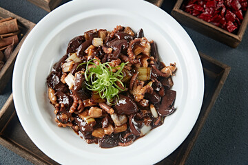 Braised Octopus with Scallion, Mushroom and Seafood