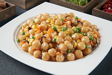 Fried sesame balls with corn and green beans