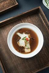 Abalone stewed with bamboo fungus in a thick soup