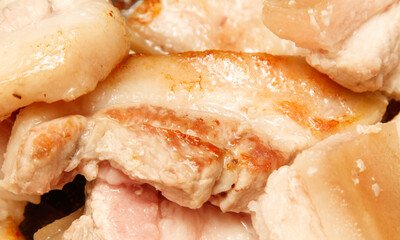 A close up of pork chops with a brown crust
