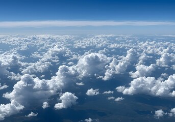 Fototapeta premium Aerial View of Fluffy White Clouds Against a Deep Blue Sky
