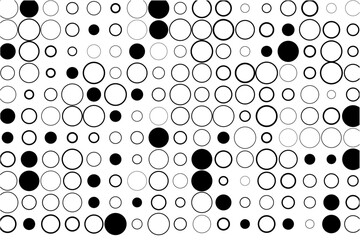 Abstract grid of circles with random black fills