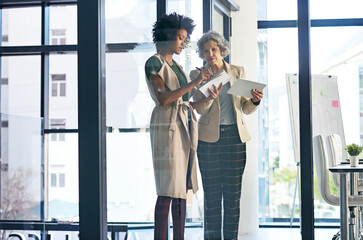 Business women, writing and planning with tablet for project discussion, agenda or tasks at office....