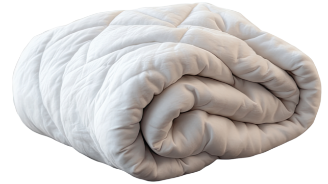 Cozy Comfort: Rolled Quilted Blanket: Capture the inviting embrace of a tightly rolled, quilted blanket, beckoning you towards relaxation and peaceful slumber. A symbol of comfort and serenity.
