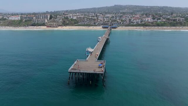 Aerial view from ocean looking at San Clemente pier and coast