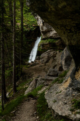 Pericnik waterfall is a beautiful drop from the mountain cliff, in Triglav National Park. Slovenian waterfall. Long for walking and trekking, enter inside the cave to admire it. Powerful and majesty.