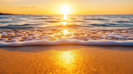 Beautiful sunset over the ocean with waves crashing on the beach and the sky filled with orange and red hues