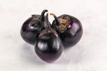 Raw violet and black eggplant